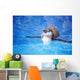 Baby Penguin Floating In Turquoise Water Wall Mural