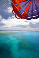 Fiji, Colorful parachute over reef and Pacific Ocean Wall Mural