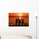 USA, Hawaii, Oahu, Boys holding canoe at sunset Wall Mural