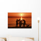 USA, Hawaii, Oahu, Boys holding canoe at sunset Wall Mural