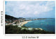 Saint Martin, view of coastal town and harbor Wall Mural