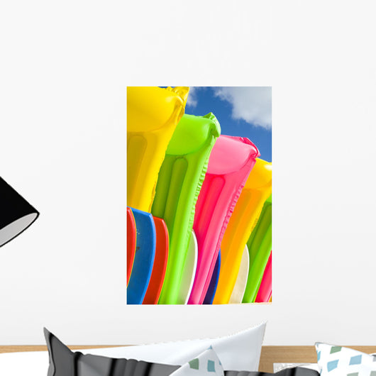 Close-Up View Of Colorful Plastic Rafts And Boogie Boards Wall Mural