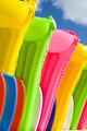 Close-Up View Of Colorful Plastic Rafts And Boogie Boards Wall Mural