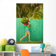 Woman holding red and pink ginger flowers Wall Mural