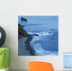 Isolated Tree On A Cliff Overlooking A Pebble Beach Along The Coast Wall Mural