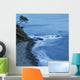 Isolated Tree On A Cliff Overlooking A Pebble Beach Along The Coast Wall Mural