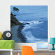 Isolated Tree On A Cliff Overlooking A Pebble Beach Along The Coast Wall Mural