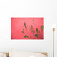 A Pink Flowering Plant Growing Beside A Red Wall Wall Mural