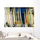 row of surfboards outside of a surfshop Wall Mural