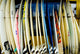row of surfboards outside of a surfshop Wall Mural