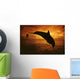 A Pair Of Atlantic Bottlenose Dolphin Leap Into A Caribbean Sunset Wall Mural