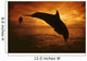 A Pair Of Atlantic Bottlenose Dolphin Leap Into A Caribbean Sunset Wall Mural