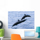 Guatemala, Puerto Quetzal, Spinner Dolphins Jumping Wall Mural