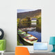 St Finbarre's Oratory And Rowing Boats On Shore Of Gougane Barra Lake Wall Mural