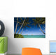 Palm tree over Pacific ocean with Mokulua island in background Wall Mural