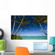Palm tree over Pacific ocean with Mokulua island in background Wall Mural