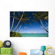 Palm tree over Pacific ocean with Mokulua island in background Wall Mural
