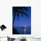 Palm tree over Pacific ocean with Mokulua island in background Wall Mural