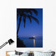 Palm tree over Pacific ocean with Mokulua island in background Wall Mural