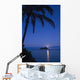 Palm tree over Pacific ocean with Mokulua island in background Wall Mural