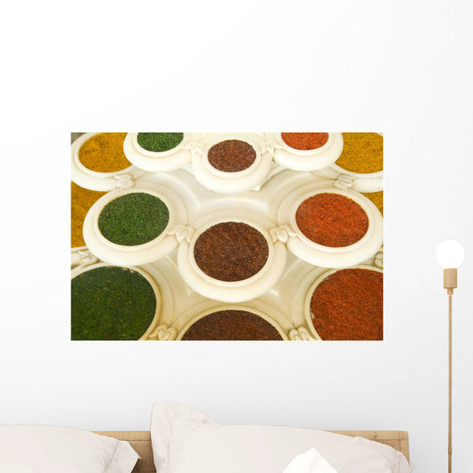 India, Agra, Abstract Colorful Bowls Of Spices In Vases From Above Wall Mural