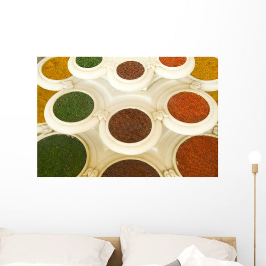 India, Agra, Abstract Colorful Bowls Of Spices In Vases From Above Wall Mural