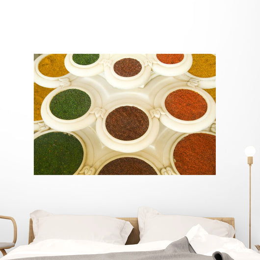 India, Agra, Abstract Colorful Bowls Of Spices In Vases From Above Wall Mural