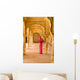 Woman In Bright Pink Sari Stands Beneath Arches Wall Mural