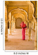 Woman In Bright Pink Sari Stands Beneath Arches Wall Mural