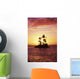 Palm Trees On Small Island Silhouetted Against Tropical Sunrise Wall Mural
