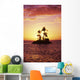 Palm Trees On Small Island Silhouetted Against Tropical Sunrise Wall Mural
