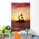 Palm Trees On Small Island Silhouetted Against Tropical Sunrise Wall Mural