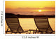 Hawaii, Two Silhouetted Chairs On Beach At Sunset, View From Behind Wall Mural