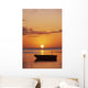 Sun Setting Over Ocean, Boat Silhouetted Against Orange Sky Wall Mural