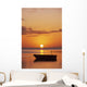 Sun Setting Over Ocean, Boat Silhouetted Against Orange Sky Wall Mural