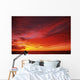Bright Orange Sunset Over Ocean Wall Mural