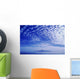 Cotton-Like Clouds In Blue Sky Over Smooth Ocean Water Wall Mural