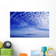 Cotton-Like Clouds In Blue Sky Over Smooth Ocean Water Wall Mural