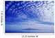Cotton-Like Clouds In Blue Sky Over Smooth Ocean Water Wall Mural