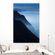 Silhouetted Cliffs Along Foggy Ocean Shoreline Wall Mural