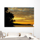 Silhouette Of Palm Trees Along The Ocean Wall Mural