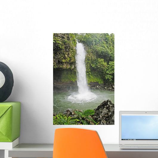 Fiji, Taveuni, Tavoro Waterfall cascading into tropical pool Wall Mural