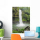 Fiji, Taveuni, Tavoro Waterfall cascading into tropical pool Wall Mural