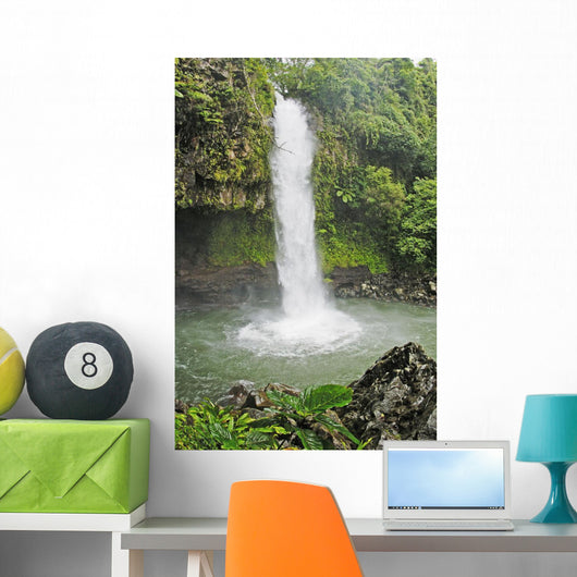 Fiji, Taveuni, Tavoro Waterfall cascading into tropical pool Wall Mural