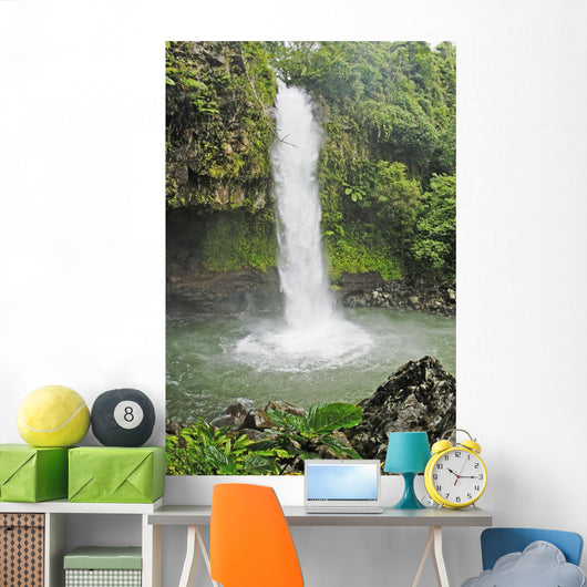 Fiji, Taveuni, Tavoro Waterfall cascading into tropical pool Wall Mural