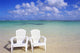 White Beach Chairs On Beautiful Beach, Clear Turquoise Water Wall Mural