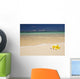 Two Plumerias Resting On The Sand Of A Gorgeous Tropical Beach Wall Mural