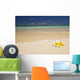 Two Plumerias Resting On The Sand Of A Gorgeous Tropical Beach Wall Mural