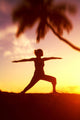 Hawaii, Maui, Olowalu, Woman Doing Yoga At Sunset Under Palm Tree Wall Mural