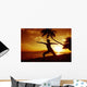 Woman Doing Yoga By The Ocean At Sunset Under Palm Tree Wall Mural